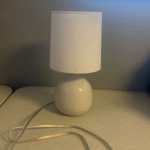 White/off white side table lamp. No bulb.